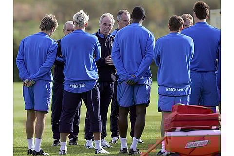 Soccer Eriksson Obit: Sven Goran Eriksson gives instructions to players ahead of their World Cup qualifying match against Poland in Manchester, Monday Oct. 10, 2005